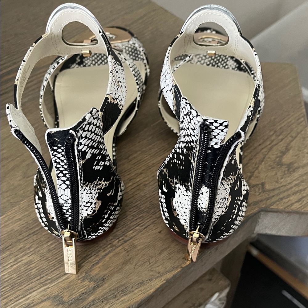 BCBGeneration Black and White Snake Print Sandals

Box included
